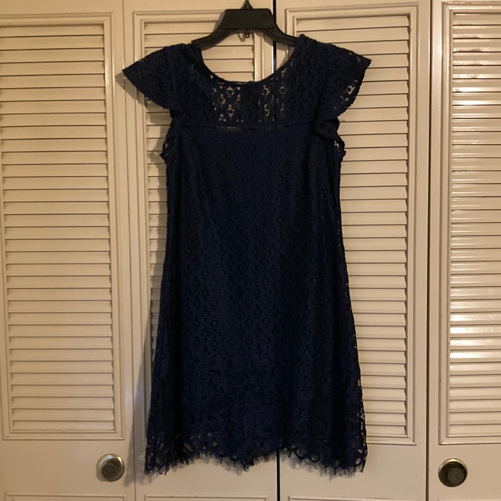 Knee length navy blue dress size small. Open back with tie knot.